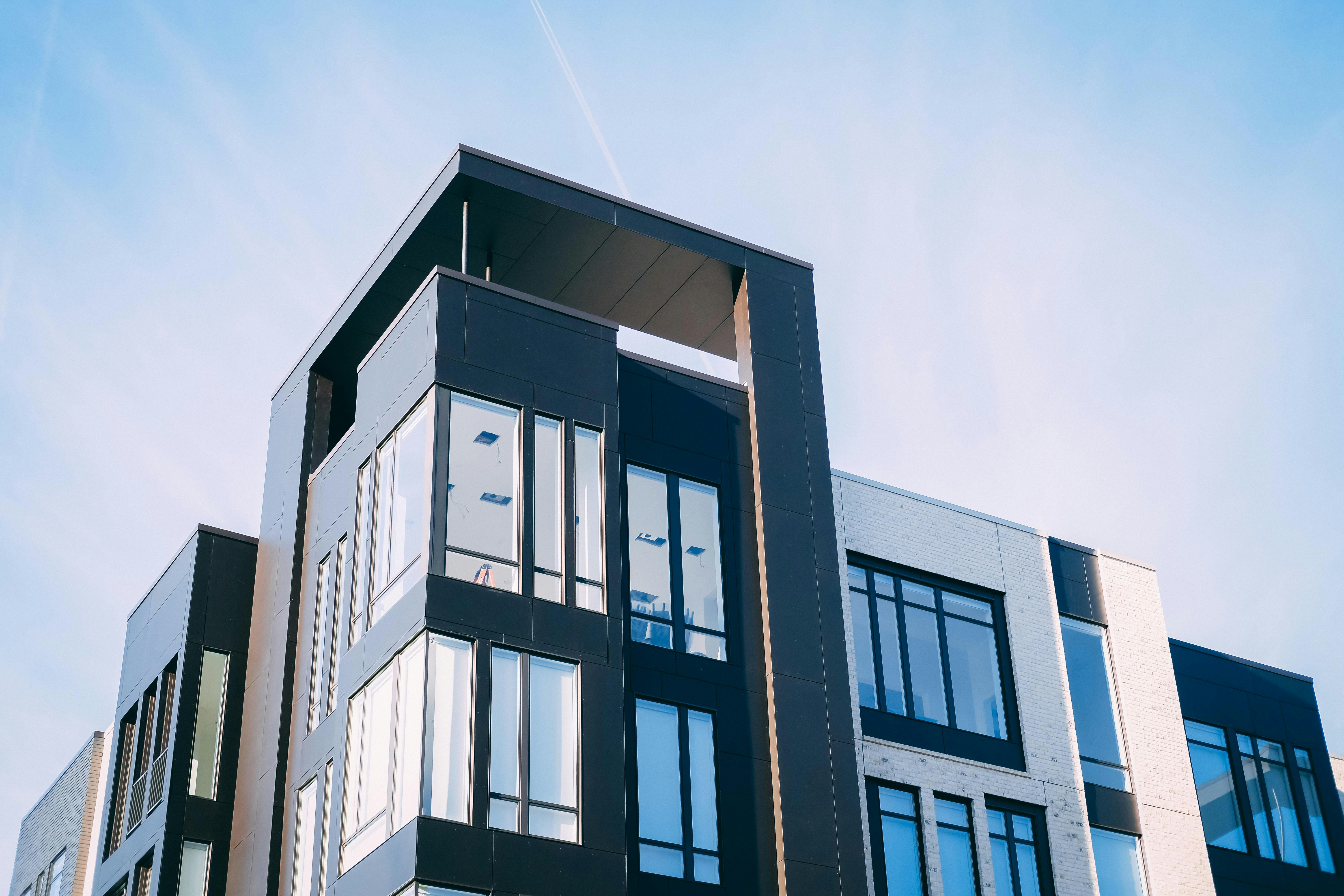 Modern residential building representing Price Pulse AI pricing intelligence